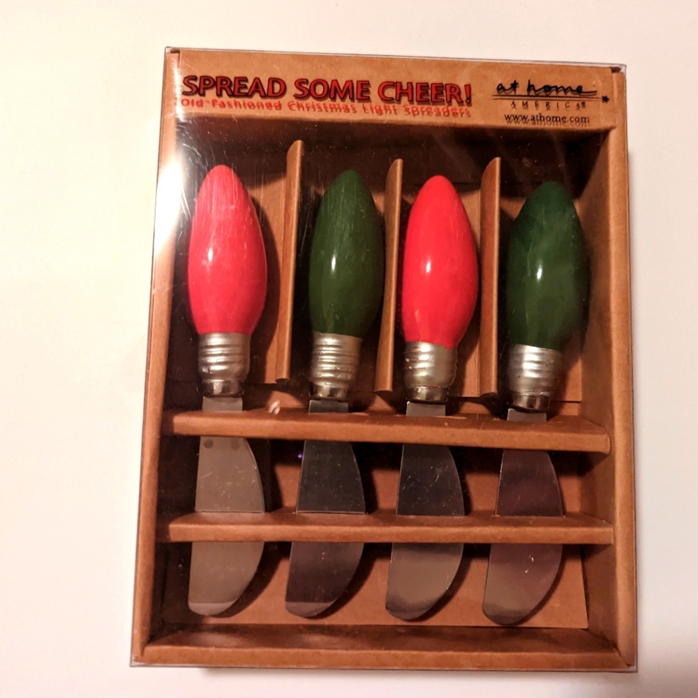 Holiday light bulb cheese knives